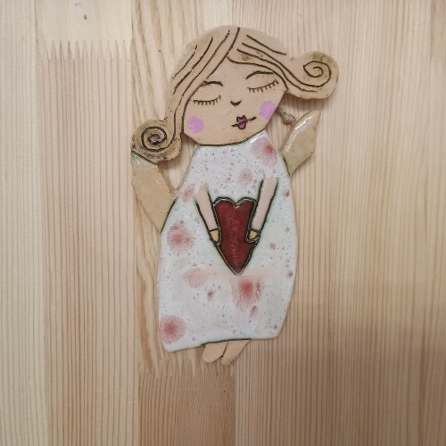 aniołek ceramiczny z lokami biały.jpeg